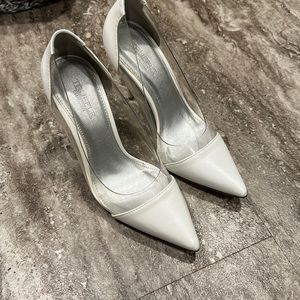 White pointed heels